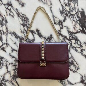 Valentino Garavani Rockstud Burgundy Leather Glam Lock Shoulder Bag.